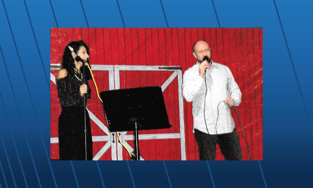 Megan McCombs and Brandon Mabe with the Baldknobbers musical act perform at a benefit concert in January at VFW Post 280 in Columbia, Mo. 