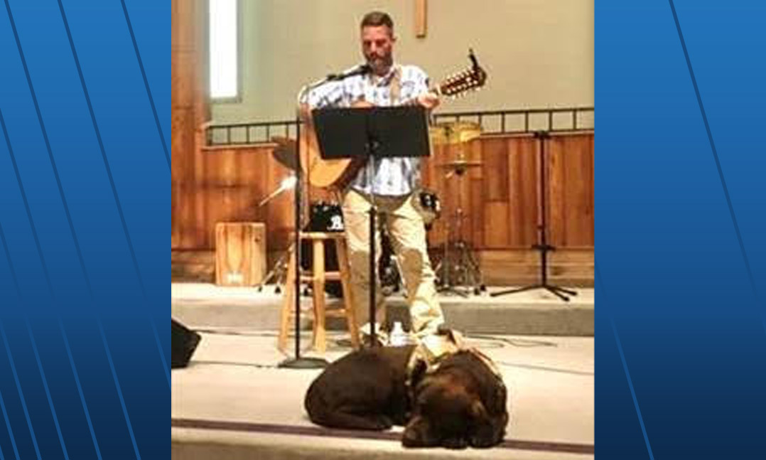 Veteran Lee Otto and his service dog, Sayge