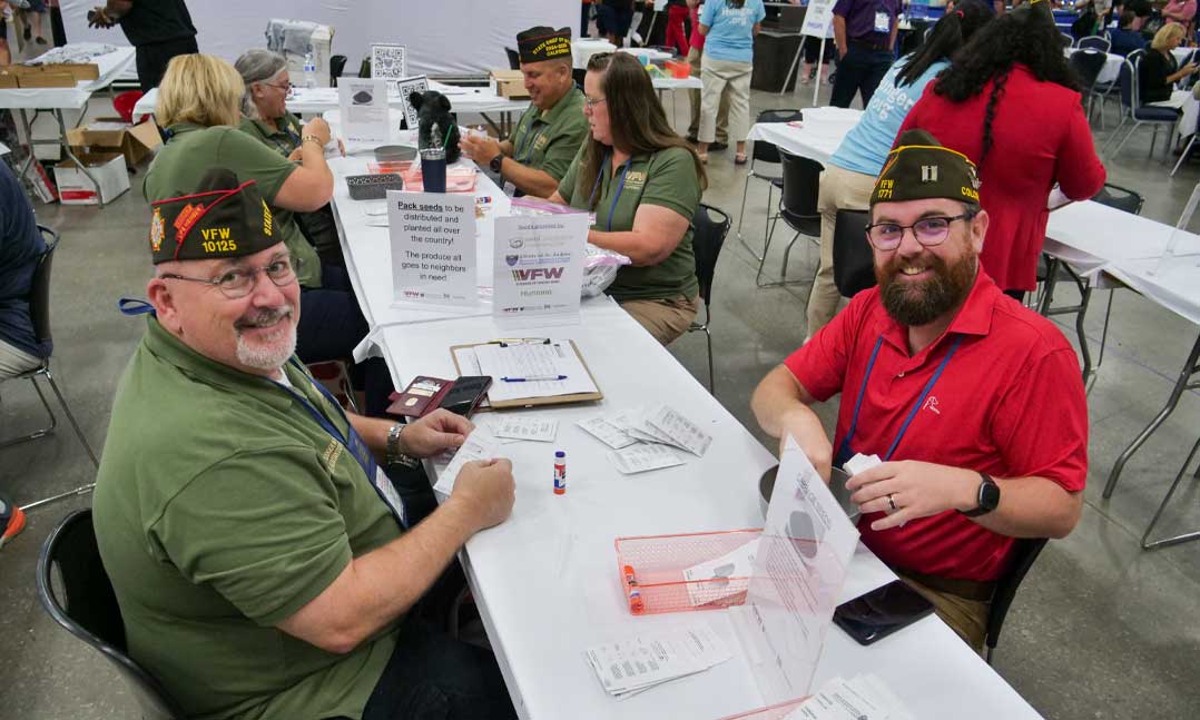 VFW members pack garden seeds for Uniting to Combat Hunger
